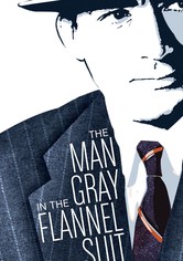 Mannen i grå kostymen